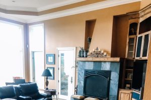 freshly vacuumed living room with huge fireplace