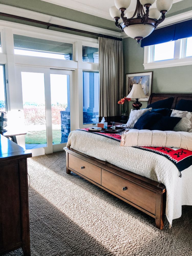clean master bedroom with lovely patio