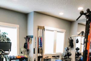 home gym with lots of equipment