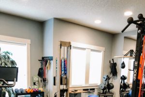 home gym with lots of equipment