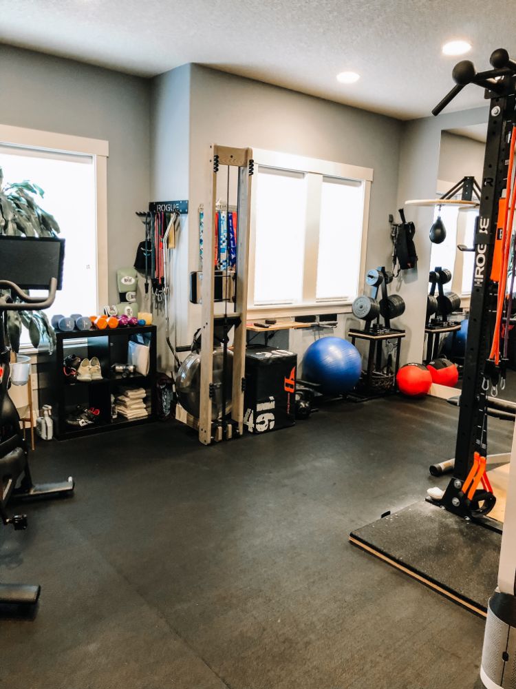 home gym with lots of equipment