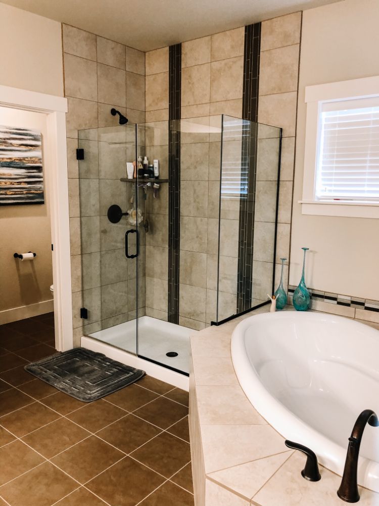 residential cleaning clean corner soaker tub and separate glass shower
